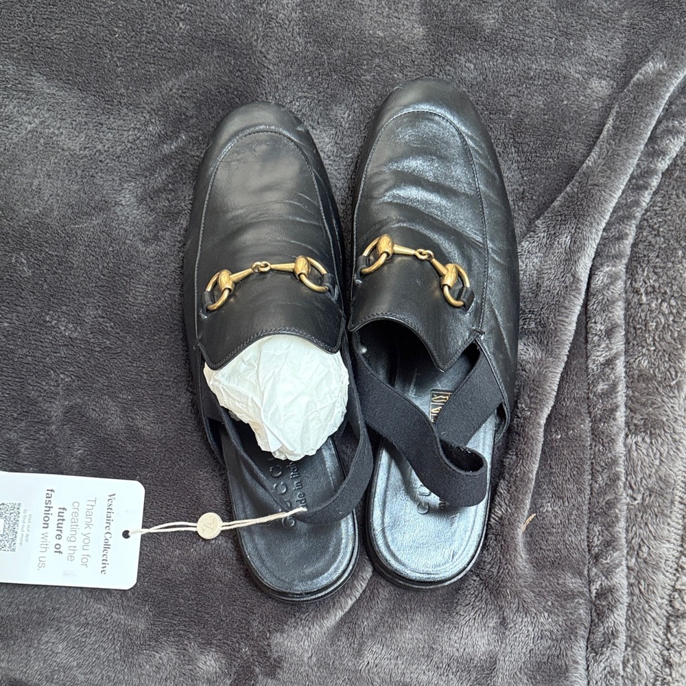 Gucci Black Leather Loafers with Gold Accents